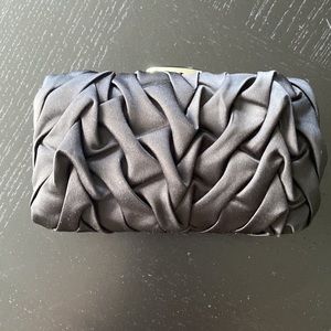 Cache Hard Sided Black Clutch